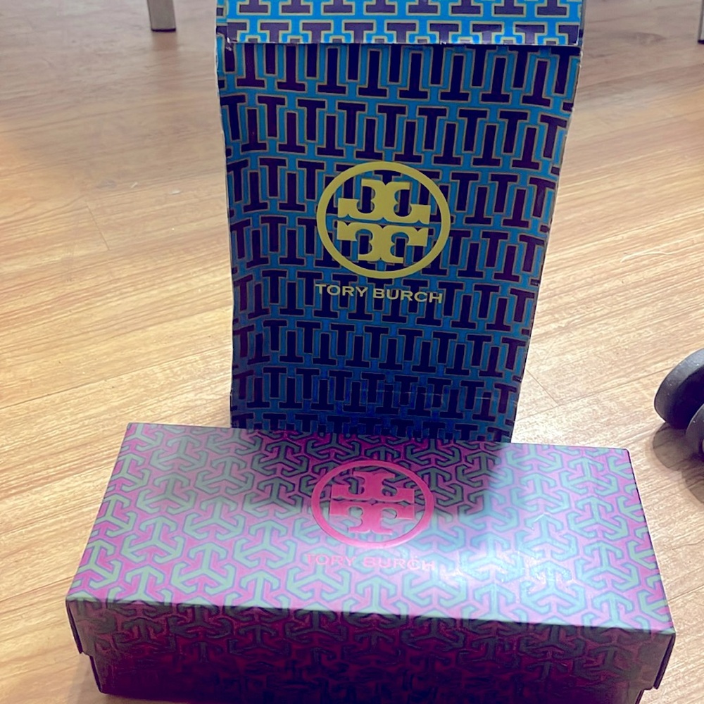 Tory Burch Summer or pool sandals.